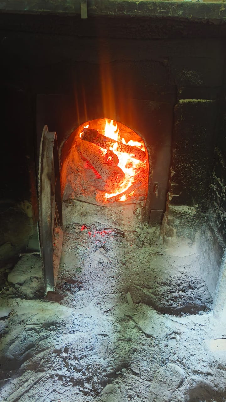 Bright kiln fire with cinnamon wood burning